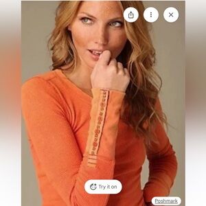 Orange stud cuff thermal